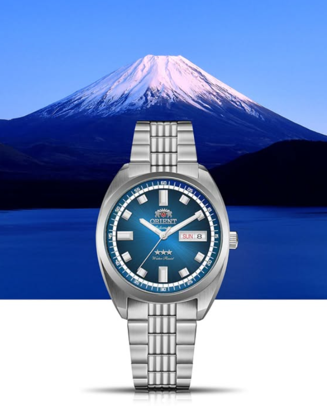 Relógio Heritage Orient de pulso masculino automático fundo azul foto oficial de divulgação